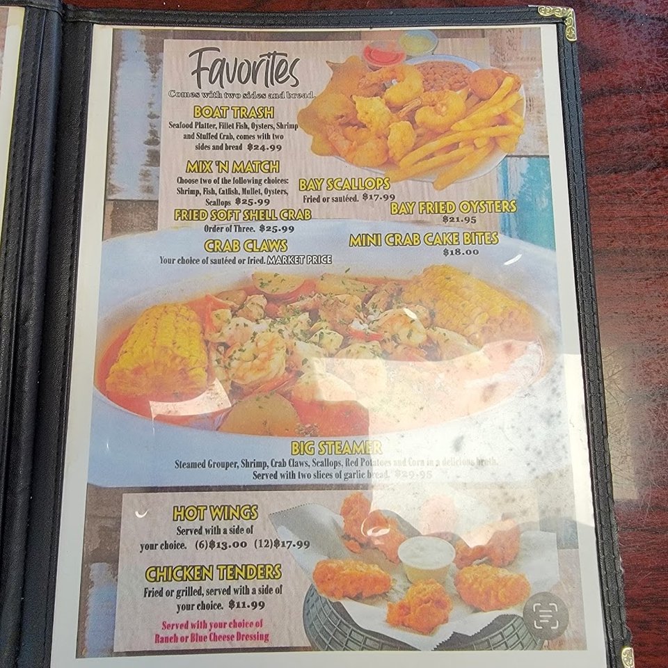 Seafood dishes arranged on plates